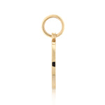 Gold pendant with a bale on a white background