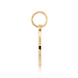 Gold pendant with a bale on a white background