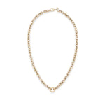 A delicate gold chain necklace with a small circular ring charm at the bottom center, displayed on a clean white background.