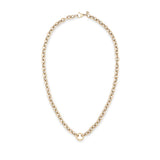 A delicate gold chain necklace with a small circular ring charm at the bottom center, displayed on a clean white background.