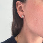 Diamond studs in ear