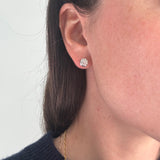 Diamond studs in ear