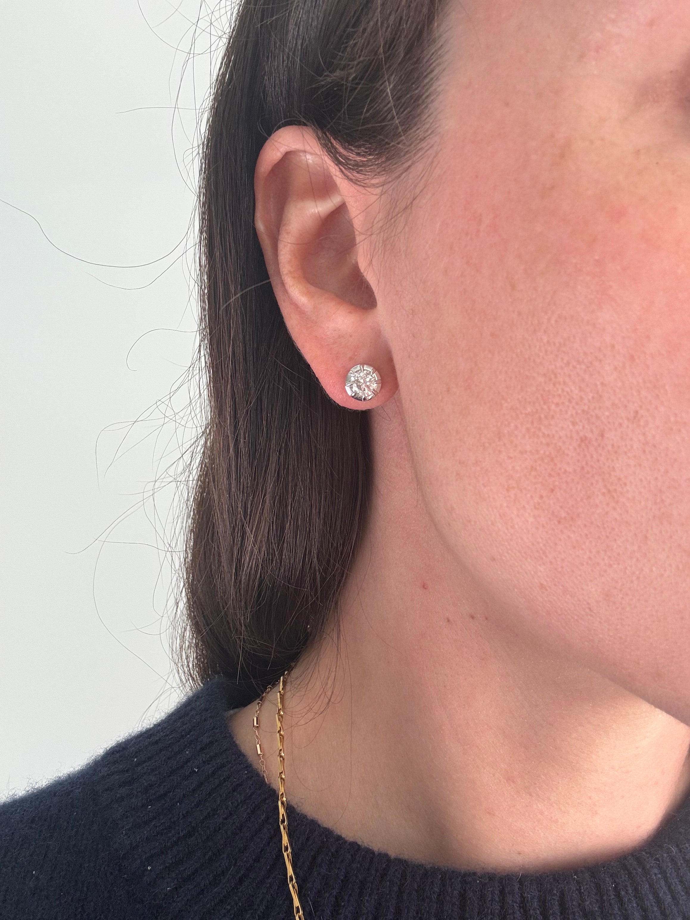 Diamond studs in ear