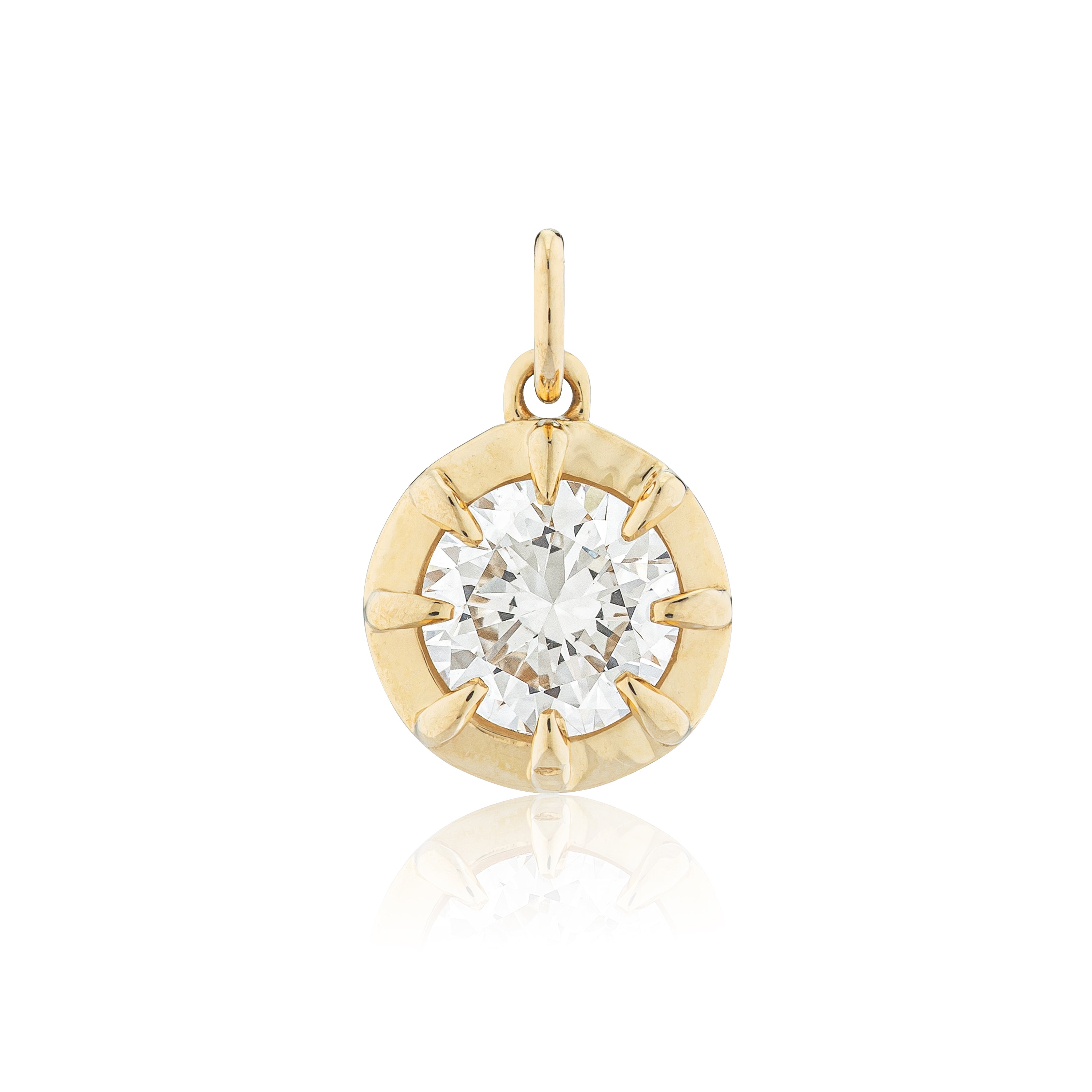 Gold pendant with a Diamond on a white background